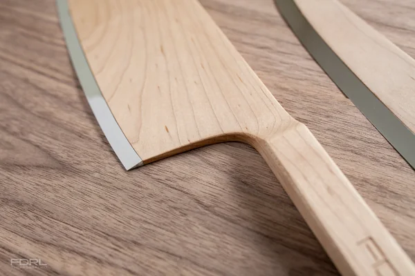 Moodboard reference: wooden axe with a thin steel cutting edge